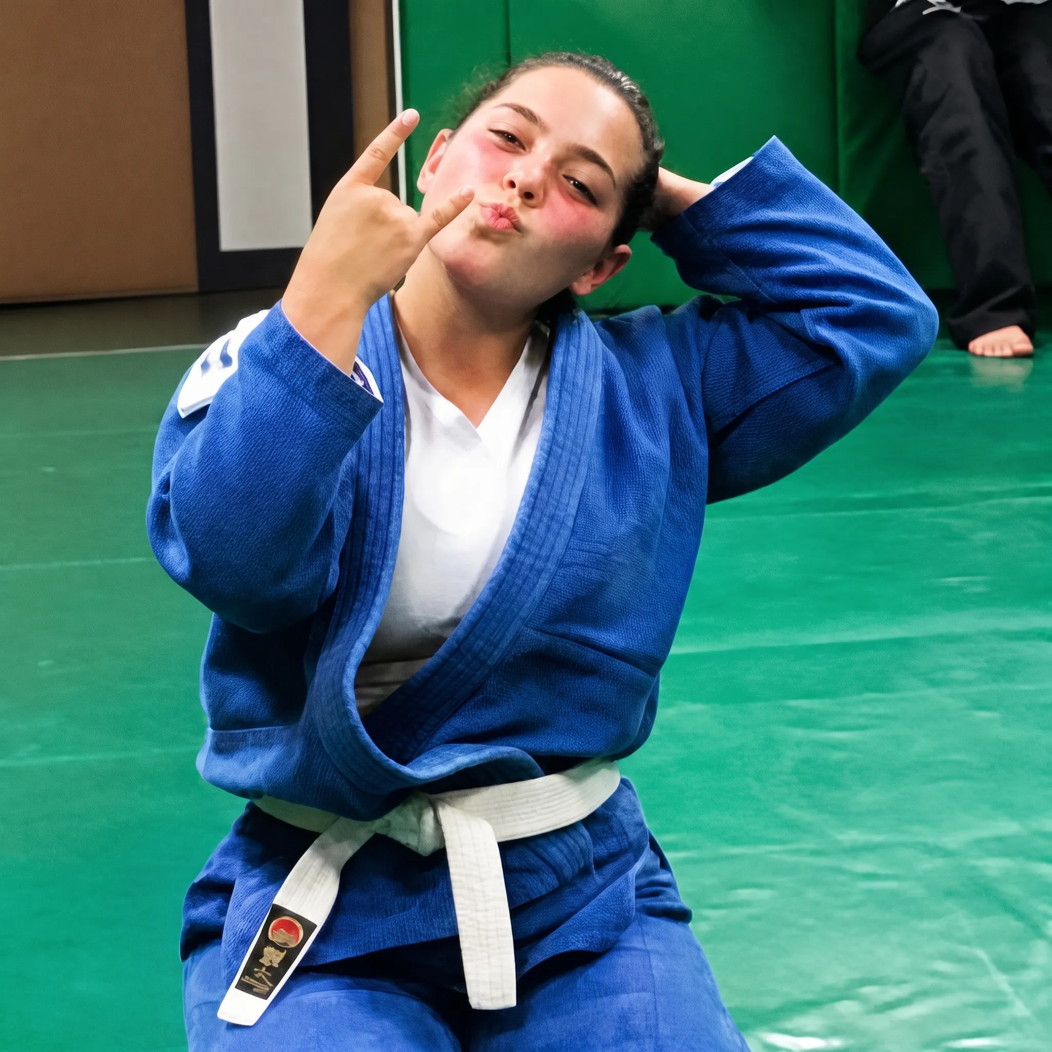 A Boran Brazilian Jiu-Jitsu student in her gi at the academy